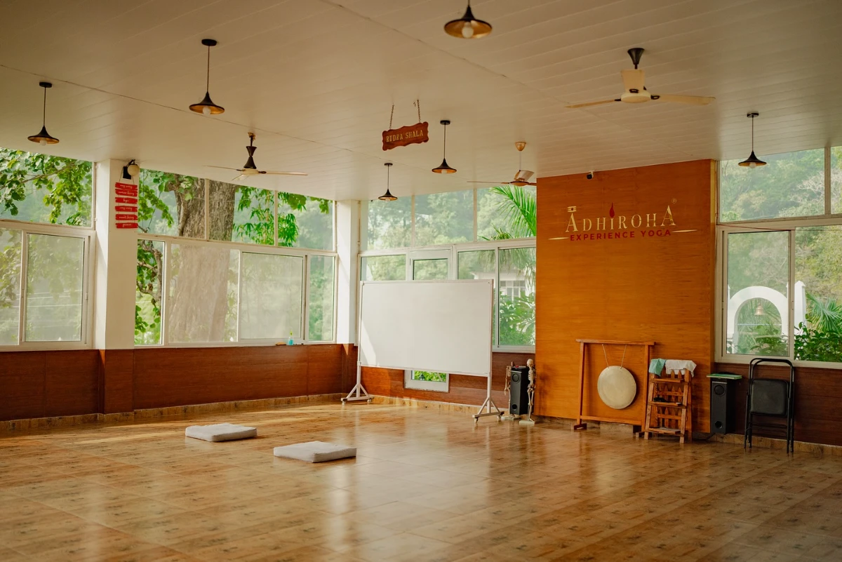 Serene view of lush forests surrounding Adhiroha’s Wellness Centre in Rishikesh