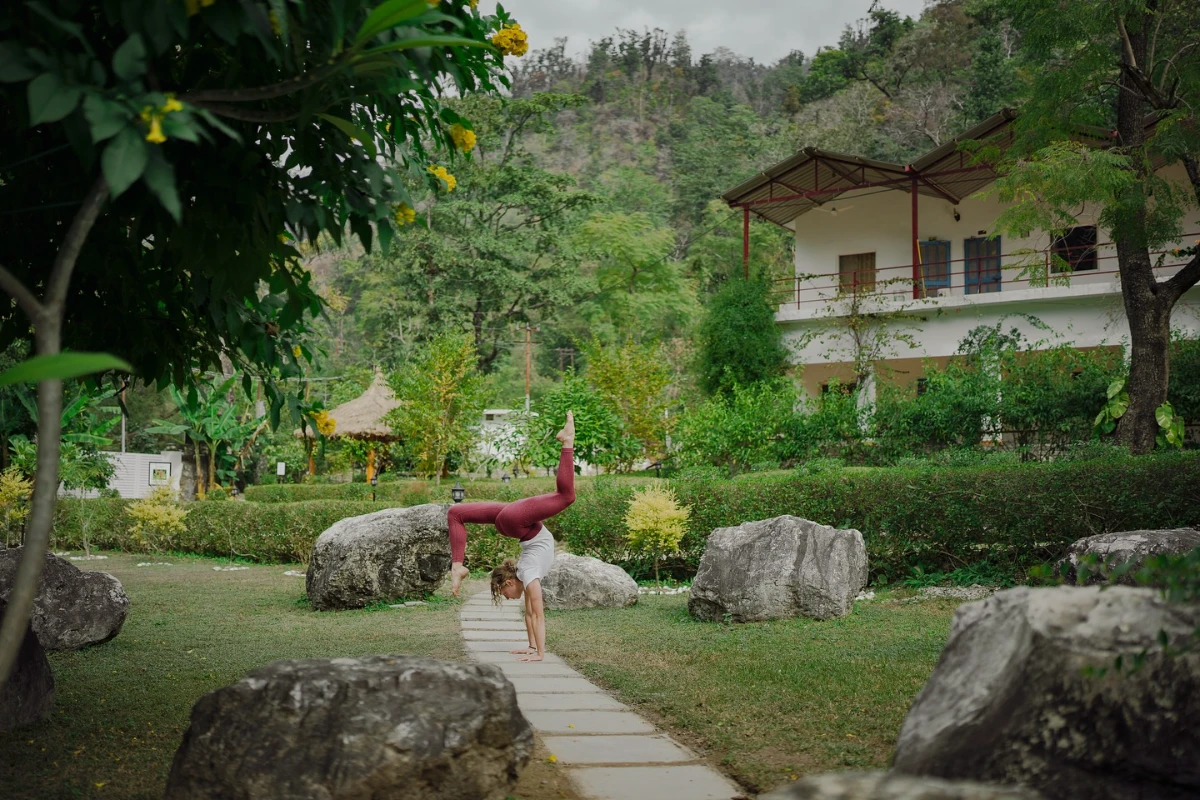 Sunrise meditation session by a flowing brook at Adhiroha