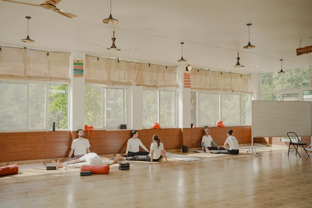 Participants engaging in a Satsang discussion at Adhiroha’s retreat