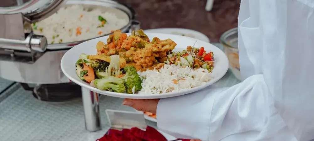 Fresh sattvic vegetarian meal being served at the Adhiroha yoga ashram dining hall