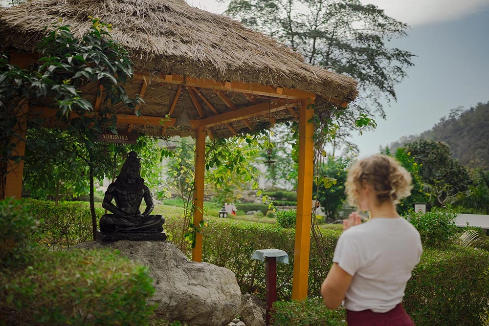 A sacred Shiva shrine in the peaceful gardens of the Adhiroha ashram