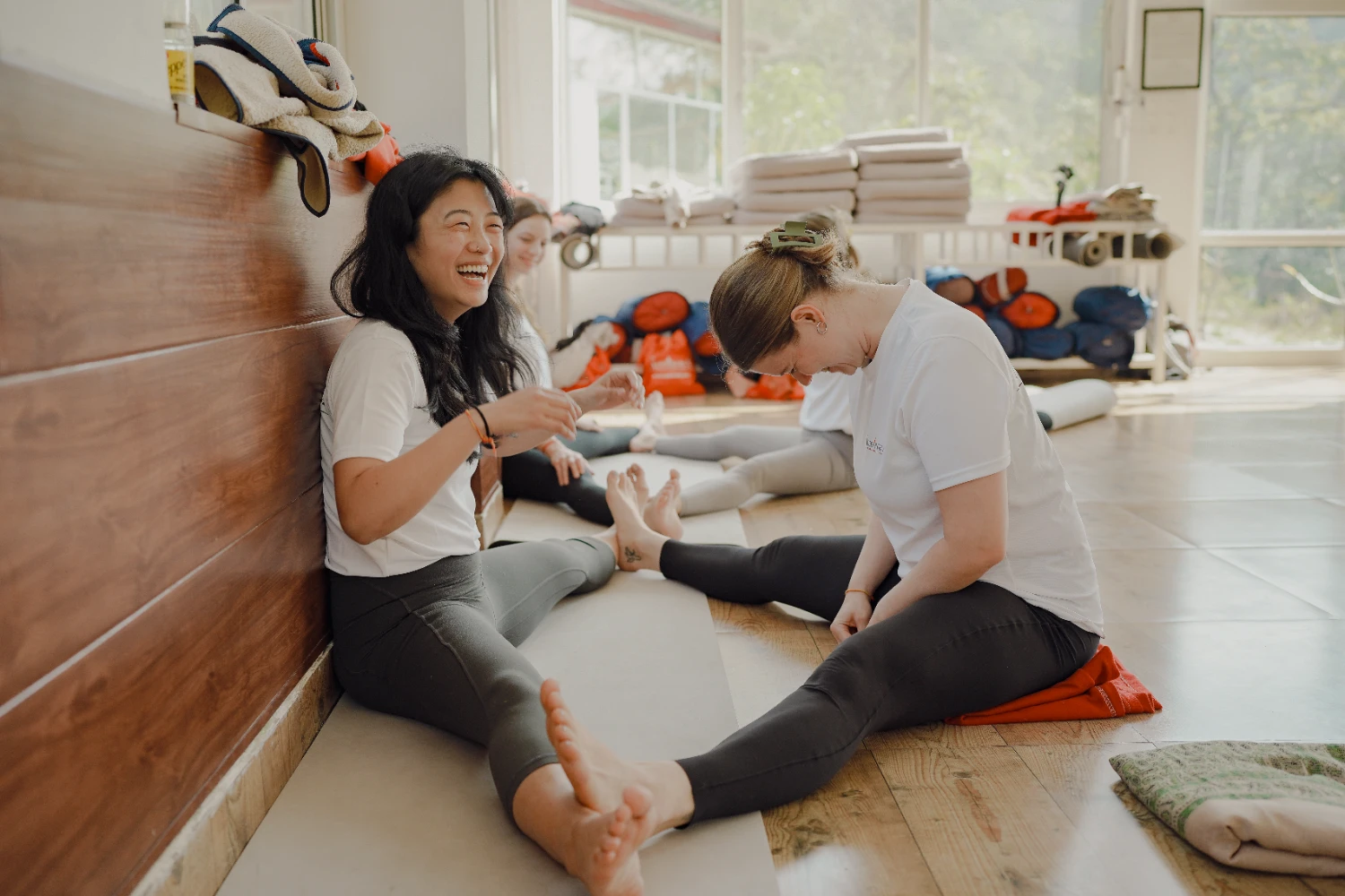 A teacher guiding a student safely through an adjustment