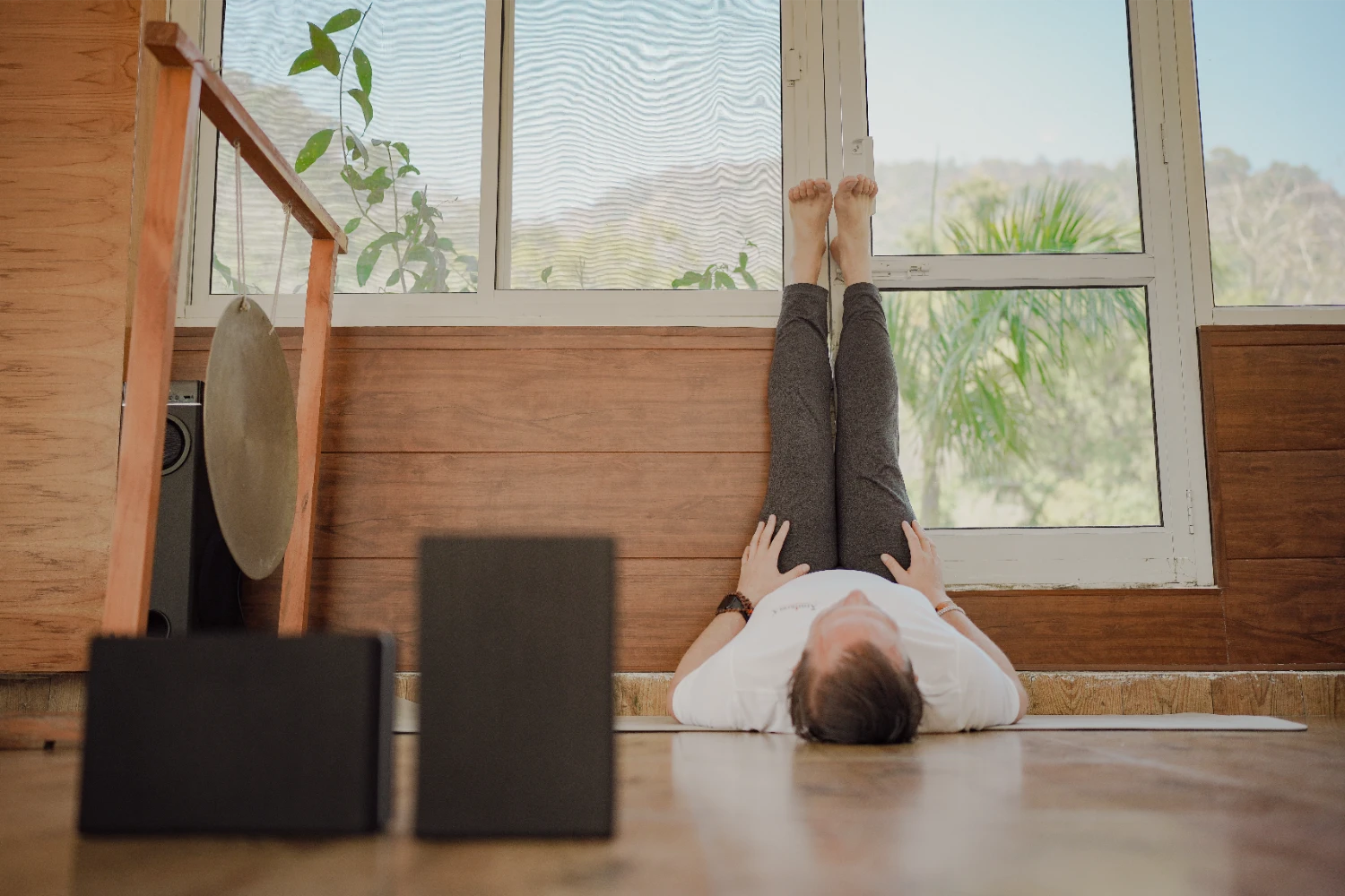 A student moving through a deep, steady posture